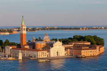 Venice, Italy – 06-20-2018: Basilica of San Giorgio Maggiore. Panoramic bird's-eye view. Lido Island in the background.