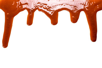 Wall Mural - Background of flowing caramel sauce isolated on white.