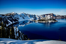 Crater Lake And Wizzard Island In Crater Lake National Park In The Winter Season With Snow