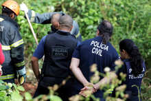 Salvador, Bahia / Brazil - August 24, 2015: Civil Police Investigators Are Investigating A Person Murdered In The Bush Area In The City Of Salvador.