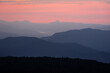 The silhouette of the Linville Gorge Wilderness area taken on a warm and colorful summer morning from the Blue Ridge Parkway 