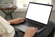 © New Africa - Woman working with modern laptop indoors, closeup. Space for design