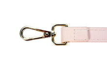 Swivel Lobster Clasp Snap Hook Clip With Leather Shoulder Bag Strap Isolated On White Background. Metal Swivel Clip Snap Hook Or Gold Trigger Webbing Bag Hook Isolated