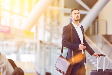 Canvas Print - Business traveler makes air travel in the airport