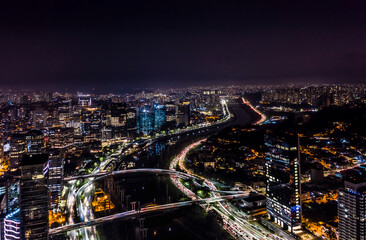 Pinheiros River with business center in the background in Sao Paulo, Brazil