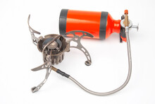 Gas And Petrol Tourist Burner On A White Background. Items For Tourism And Survival. Cooking.