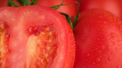 Poster - Tomato. Half of tomato macro shot. rotating. Ripe natural tomatoe close-up. Organic tomato rotating