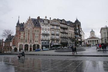 Beautiful ancient buildings and Brussels Royal Square with St Jacques Church at The Coudenberg. 