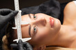 Woman in gloves preraring to the permanent makeup