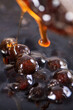 © RomixImage - Cooking, boiling brown sugar flavor tapioca pearl balls, ingredient of bubble tea, preparing food and drink, close up, recipe cookbook steps design concept.