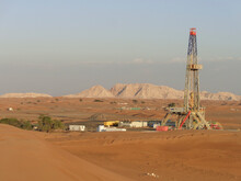 Oil Derrick For Exploration And Drilling To Search For Petroleum On Desert