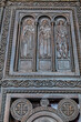 Fragments of the entrance bronze door of the Metropolitan Cathedral of the Annunciation (1862) in Metropolis square in the old town of Athens. Athens, Greece.