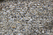 Grey flint wall background showing texture with space for copy