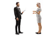 © Ljupco Smokovski - Young woman talking to a man in black suit with cliboard in his hands