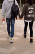© Danil Nevsky/Stocksy - Young couple walking and holding hands