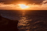 Fototapeta Desenie - sunset on the cliffs On the arch of Anguilla island in the Caribbean sea
