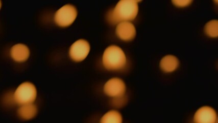 Wall Mural - Diya Lamp bokeh in dark blurry background at night. 