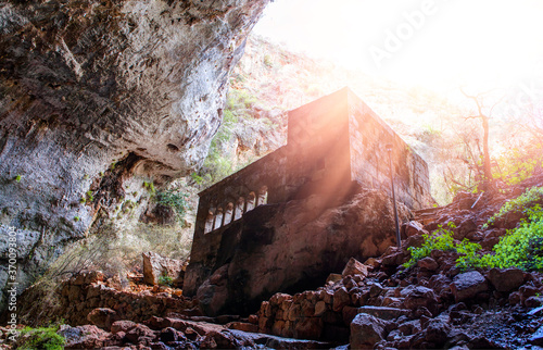 Cuadros en Lienzo Heaven and hell sinkholes with a chapel in the Mountains - Mersin Province, Turkey