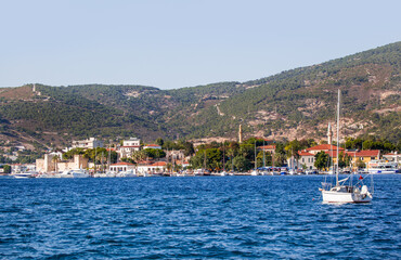 Wall Mural - Many boats in the marina with coastline of resort town of Foca - Izmir, Turkey
