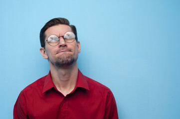 Wall Mural - Close-up portrait of a handsome positive young man