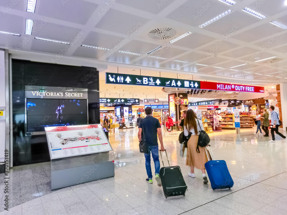 Milan, Italy - September 18, 2019: The people at airport duty free of ...
