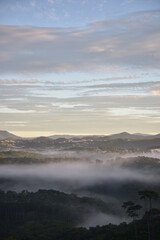 Wall Mural - dramatic sky and clouds on the mountains at sunrise