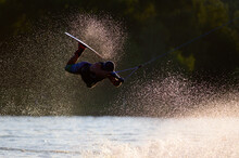 Waterskier In The Evening Light On A Lake In Austria