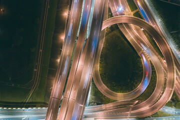 Wall Mural - Traffic Circle roundabout Aerial View - Traffic concept image, traffic circle roundabout bird‘s eye night view use the drone in Taipei, Taiwan.