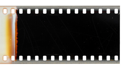 Burnt start of 35mm negative filmstrip, first dark frame on white background, real scan of film material with cool scanning light interferences on the material and scratches.
