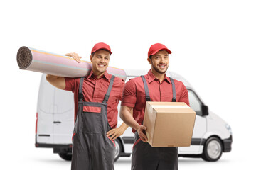 Wall Mural - Workers from a moving company with a box and carpet in front of a white van