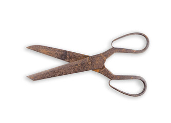 Rusty old vintage scissors on white background