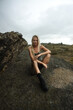 © Ольга Буянова - woman sits on a rock