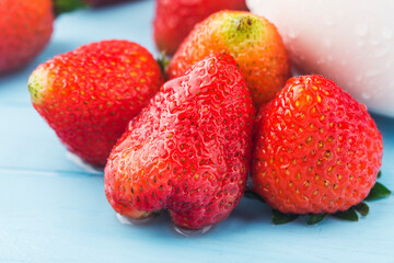 Poster - Bunch of fresh strawberries on wooden board background