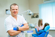 © Vadim - Dentistry, medicine, medical equipment and stomatology concept - interior of new modern dental clinic office with chair. Dentist doctor in front.