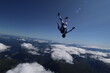 © sindret - Skydivers over snowy mountains in Norway