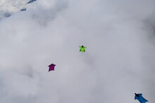Skydivers Over Mountains In Norway