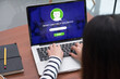 © weedezign - Asian woman ask chat bot function in app on laptop screen looking for customer support online shopping shop with apps,digital marketing concept,artificial intelligence (ai) system