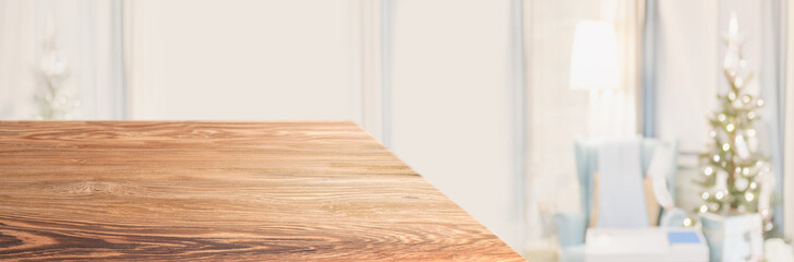 Aufkleber - Perspective wood table with blur Christmas tree decorate string light in living room at home.Panoramic wooden countertop banner mockup for product display greeting card design online content