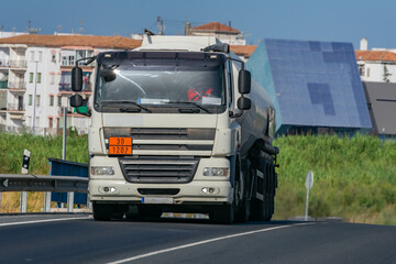 Wall Mural - Fuel tank truck leaving the city