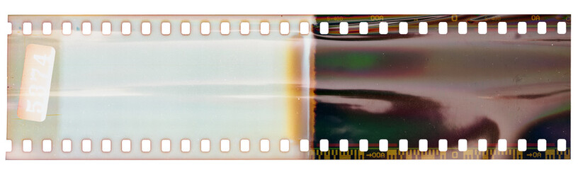Wall Mural - Start or beginning of 35mm negative film strip, first frames on white background, real scan of film material with shiny bright scanning light interferences.