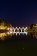 © Ldgfr Photos - Vue nocturne sur le Pont Tibère et sa réflexion sur les eaux du fleuve Vidourle à Sommières (Occitanie, France)