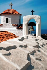 Wall Mural - Belfry and dome of Christian orthodox church in Patmos island, Greece, April 6 2007.