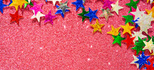 Background Of Multicolored Stars On Multicolored Paper With Sequins