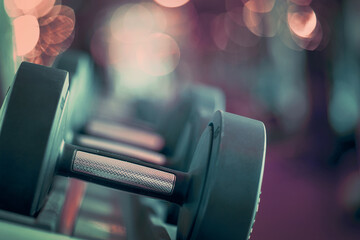 Closeup rows of dumbbells in the gym. Toning