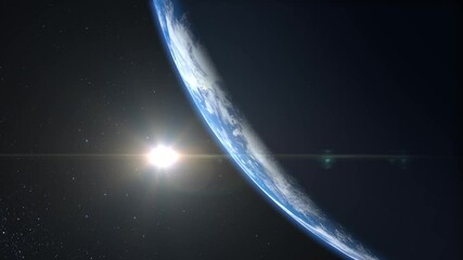 sunrise over the earth. view from space. the earth rotates. the camera flies towards the earth. real