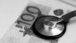 © sabdiz - Stethoscope and Euro money, black and white
