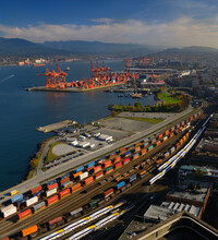 Container Shipping By Rail And The Dockyards In Burrard Inlet Vancouver Canada