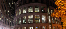 Panorama Of The Central Branch Of The Vancouver Public Library At Night With Yellow Leaves In The Fall
