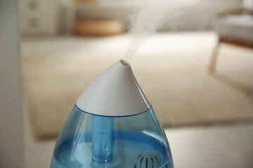 Canvas Print - Modern humidifier indoors, closeup view. Home appliance