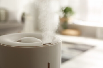 Wall Mural - Modern humidifier indoors, closeup. Space for text